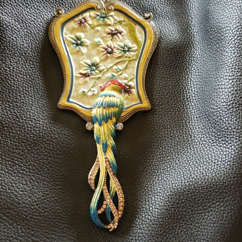 Antique elaborate handheld mirror